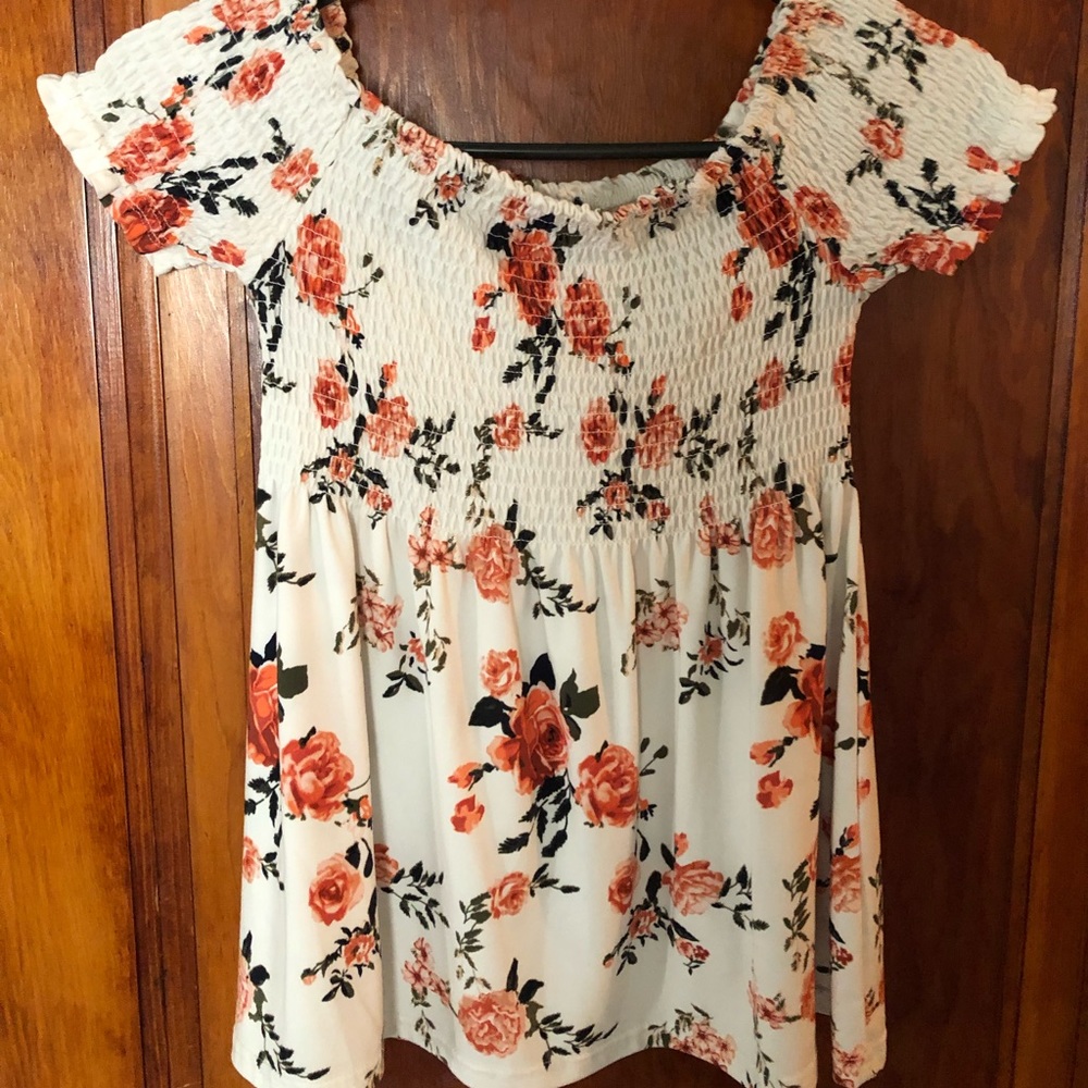 White with flowers , worn once . Very good condition